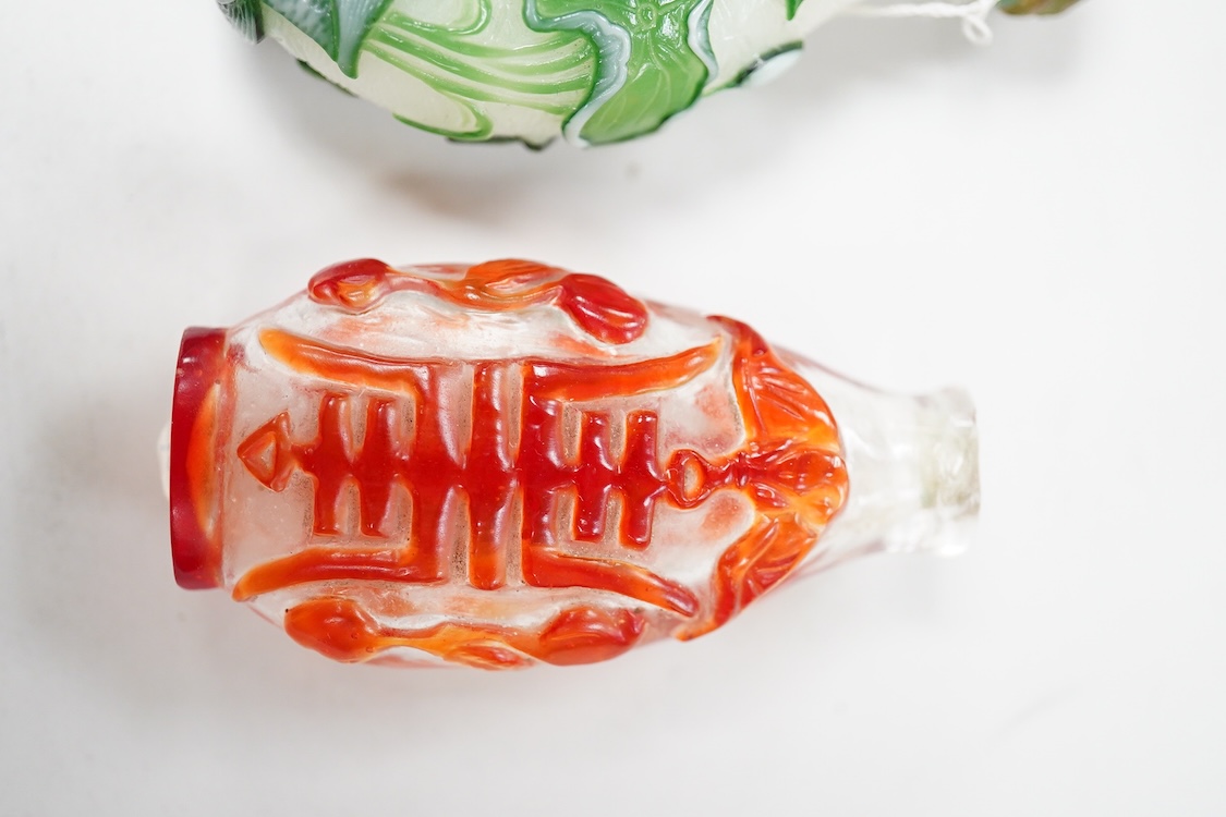 Three Chinese glass snuff bottles and a porcelain snuff bottle(4), tallest 8cm high